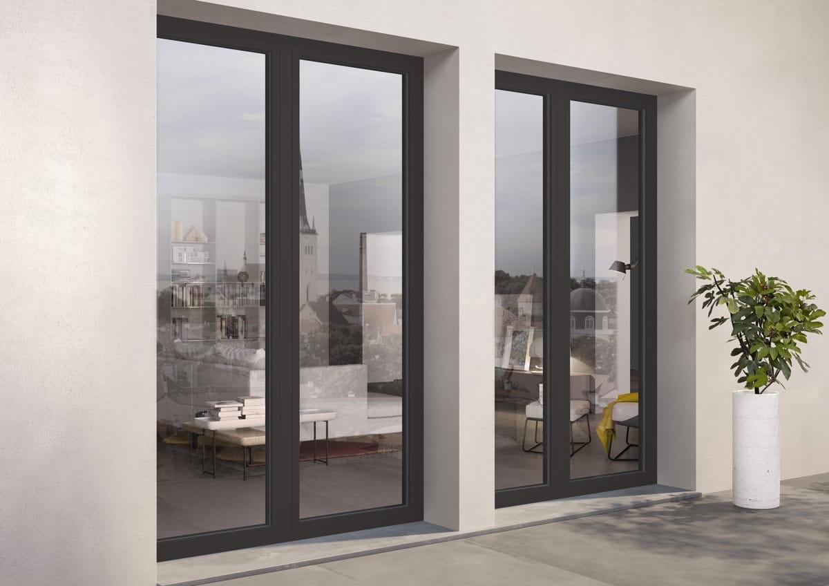 Due porte finestre in alluminio scuro aperte su un terrazzo, realizzate da Scaduto Serramenti